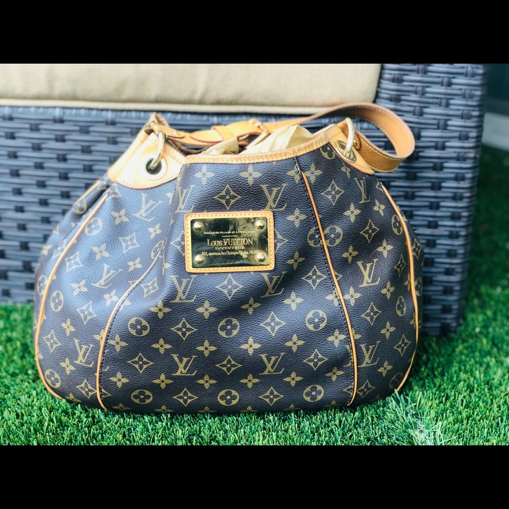Authentic Louis Vuitton.